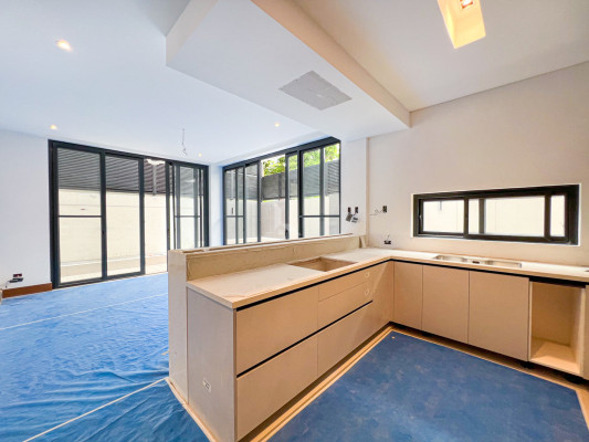 Multi-level Modern Tropical Industrial Home For Sale in Filinvest 2