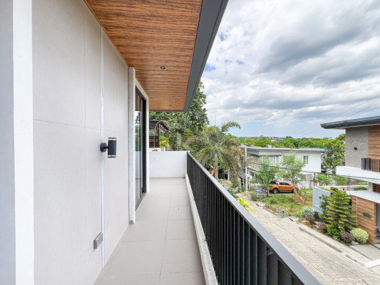 Multi-level Modern Tropical Industrial Home For Sale in Filinvest 2