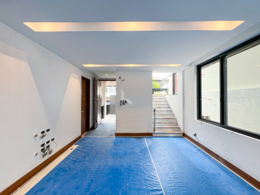 Multi-level Modern Tropical Industrial Home For Sale in Filinvest 2