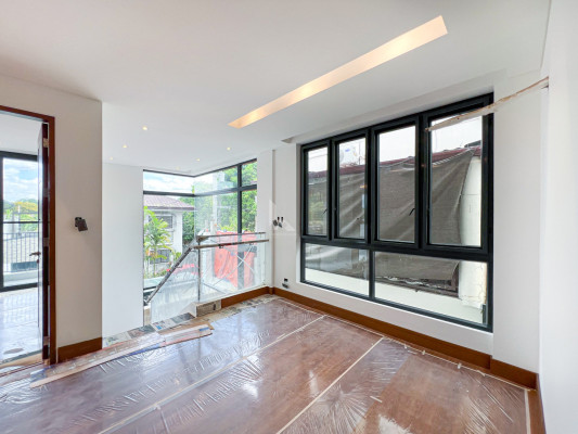 Multi-level Modern Tropical Industrial Home For Sale in Filinvest 2