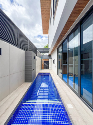 Multi-level Modern Tropical Industrial Home For Sale in Filinvest 2