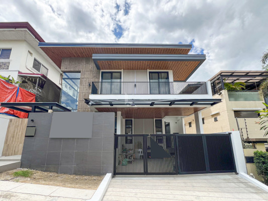 Multi-level Modern Tropical Industrial Home For Sale in Filinvest 2