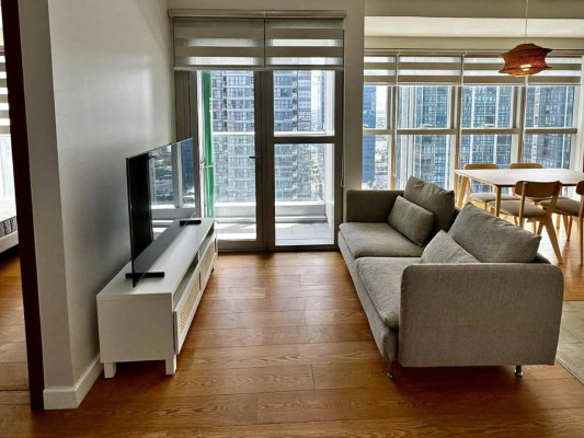 Fully-furnished 2-bedroom condo with balcony and parking for sale