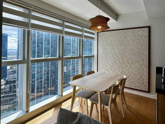 Fully-furnished 2-bedroom condo with balcony and parking for sale