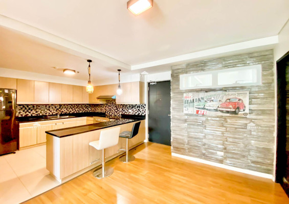 Two Serendra This fully furnished corner unit offers sweeping vistas of Laguna