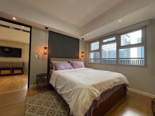 Own this Fully Furnished 1-Bedroom Corner Unit in One Maridien Tower