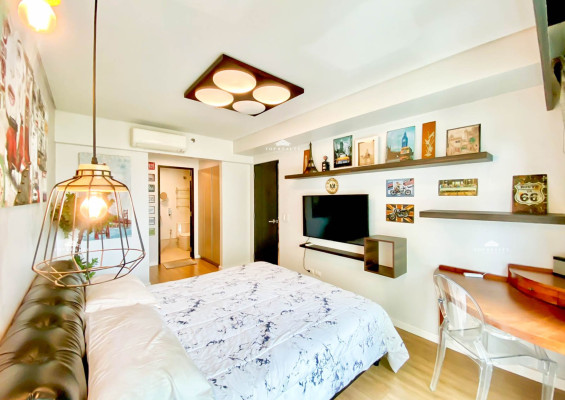 Two Serendra This fully furnished corner unit offers sweeping vistas of Laguna