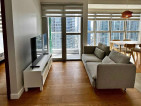 Fully-furnished 2-bedroom condo with balcony and parking for sale