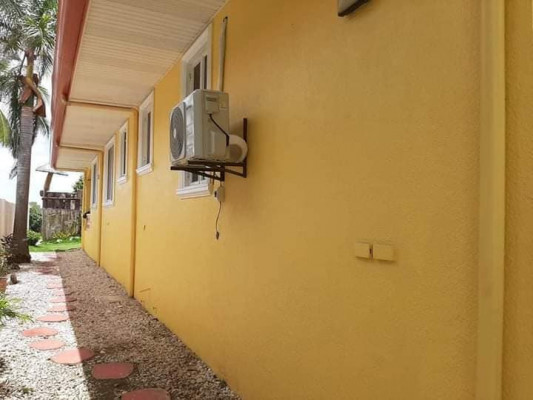 Beach lot property with fully air conditioned house for sale