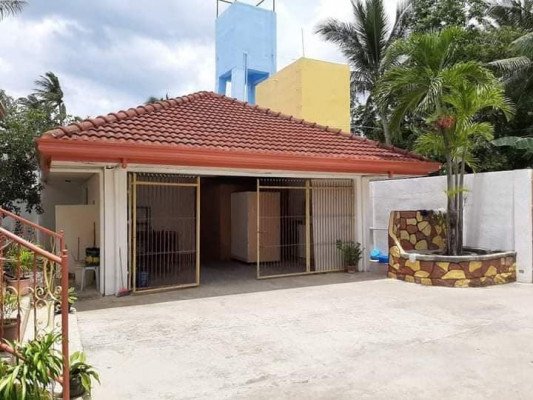 Beach lot property with fully air conditioned house for sale