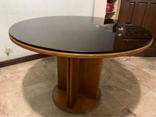 Wooden dining set with glass tabletop