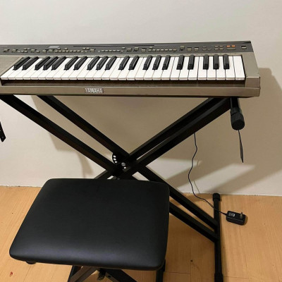 Piano with stand and stool