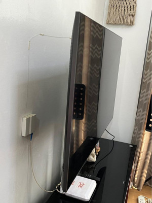 Preloved 55" Samsung QLED TV with rack