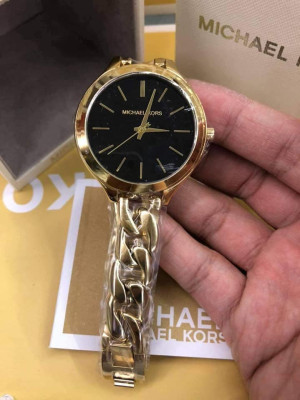 MK twisted strap Gold and Black tone