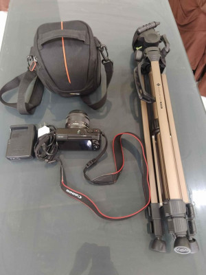 Canon Eos M10 Mirrorless Camera With Enovation Tripos