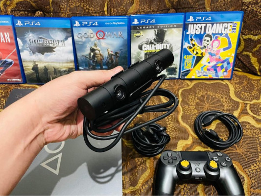 Ps4 slim 1TB Complete with games and pscamera