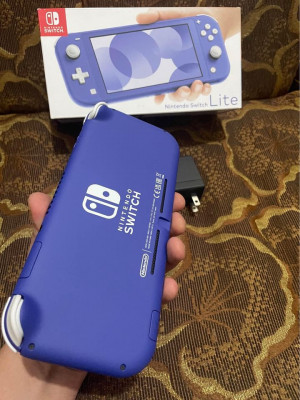 Nintendo switch lite complete with games