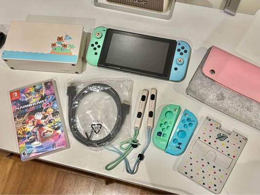 Nintendo Switch V2 Animal Crossing edition with Mario Kart Deluxe