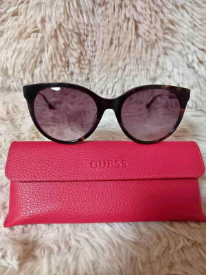 GUESS sun glasses for women.