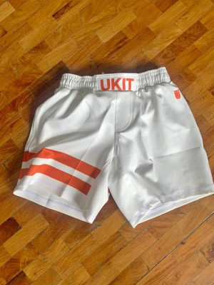 Ukit Terracotta in White Shorts