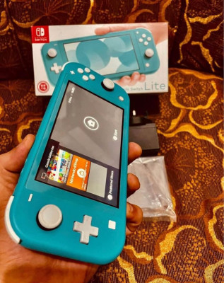 Nintendo switch lite complete with games