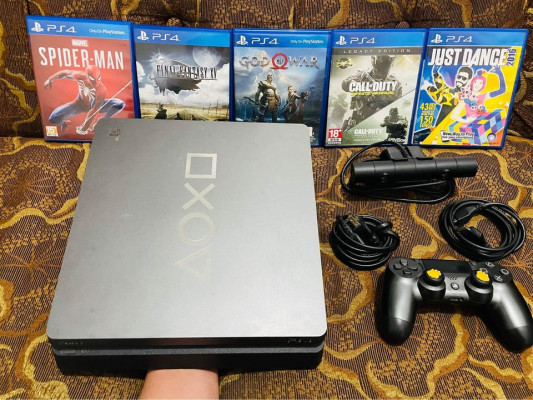 Ps4 slim 1TB Complete with games and pscamera