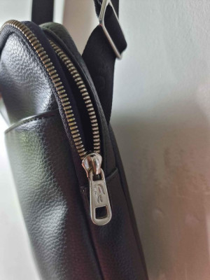 LACOSTE Sling leather bag