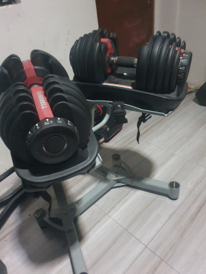 SELL RUSH ADJUSTABLE BOWFLEX DUMBELL W RACK 52.5 LBS PAIR TOTAL OF 105LBS PM MUR