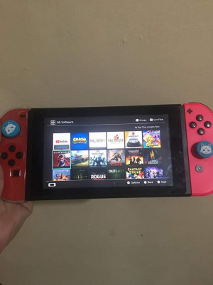 NINTENDO SWITCH V2 WITH 128GB MMC FULL OF GAMES