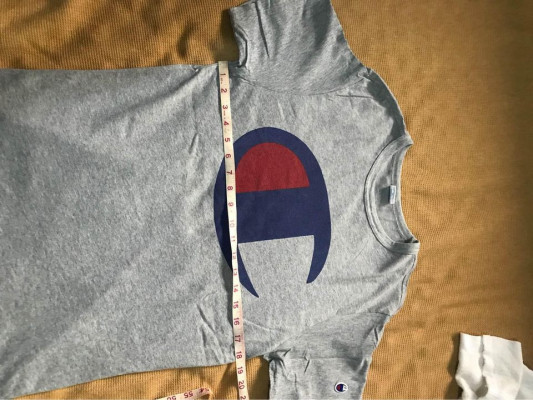 CHAMPION 100 percent cotton round neck tee.