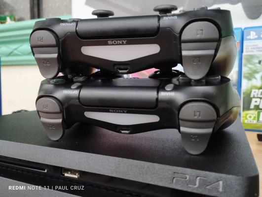 Ps4 Slim 500gb with 2 Original Ds4 V2 Controllers, Games and Accessories