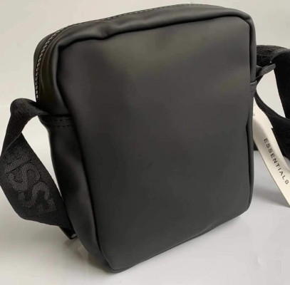 ESSENTIALS SLING BAG