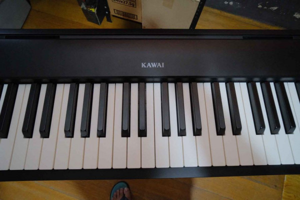 SLIGHTLY used Kawai ES110 with accessories