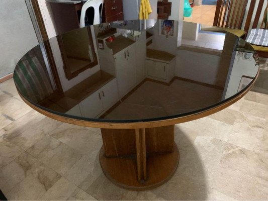 Wooden dining set with glass tabletop