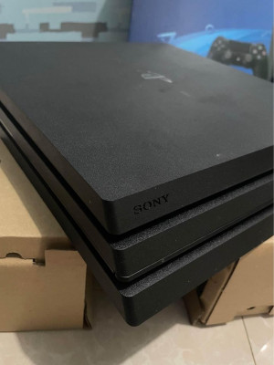 Ps4 pro 1TB complete with 4 physical games
