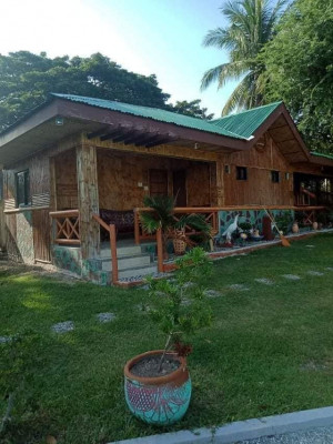 Beachfront resort with swimming pool and cottages