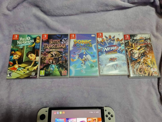 NINTENDO SWITCH OLED WITH GAMES