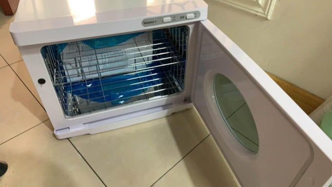 TOWEL WARMER WITH UV STERILIZER