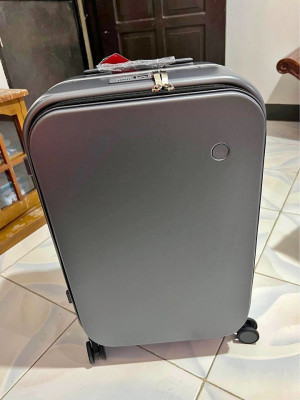 Brand New Luggage 24 Inches with Cover and Box