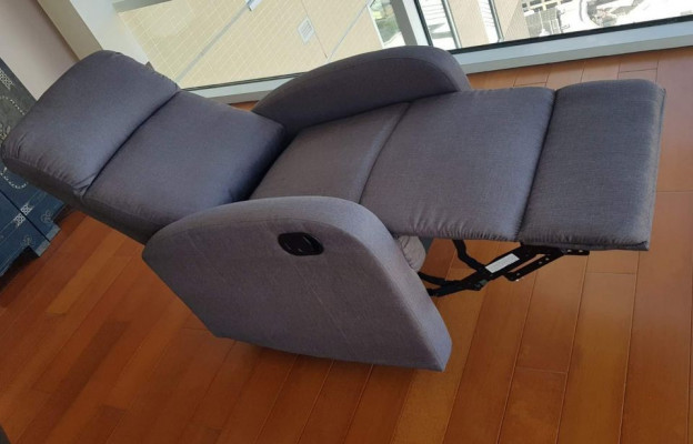 Slim and modern recliner in elegant grey fabric