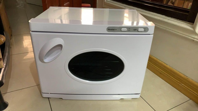 TOWEL WARMER WITH UV STERILIZER