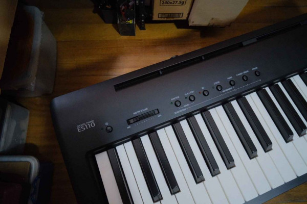 SLIGHTLY used Kawai ES110 with accessories