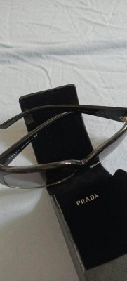 Pandora bracelet & Prada sunglasses