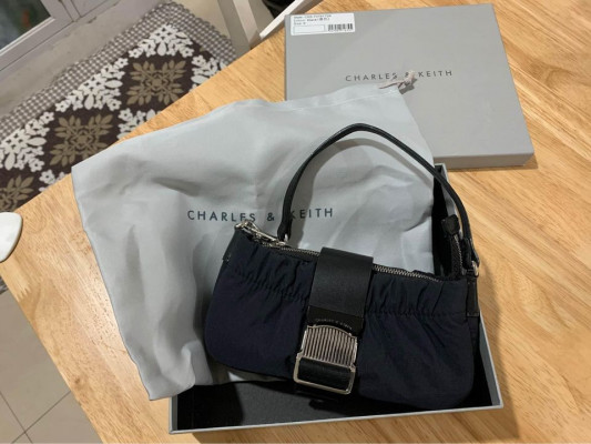 Original Charles and Keith Sling bag with box and pouch