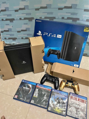 Ps4 pro 1TB complete with 4 physical games