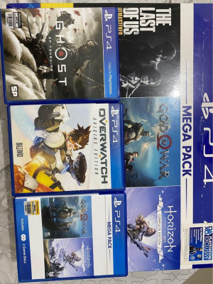 PS4 1TB with 2 controllers 4 games