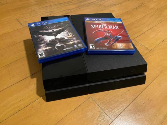 PS4 with games and controller