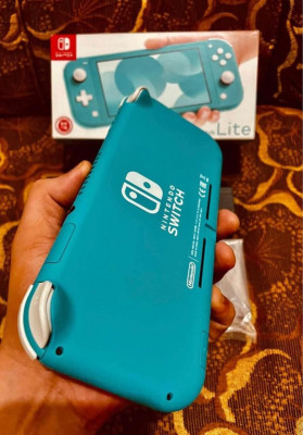 Nintendo switch lite complete with games
