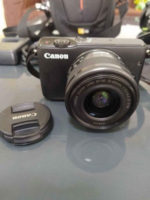 Canon Eos M10 Mirrorless Camera With Enovation Tripos