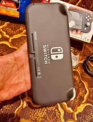 Nintendo switch lite complete with games
